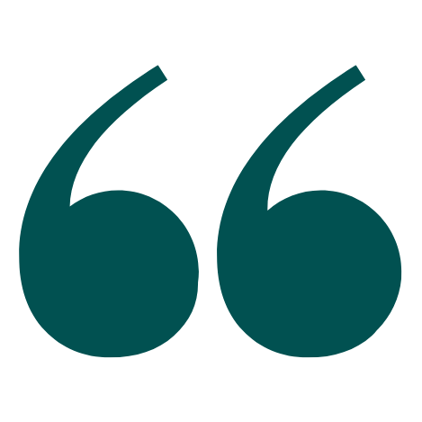 Large teal quotation marks on a black background.