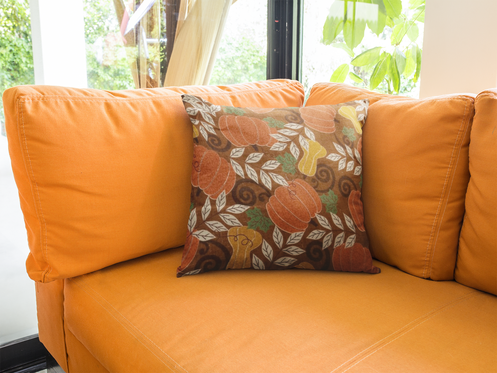 square-pillow-template-lying-on-an-orange-sofa-in-a-living-room-a14921.png