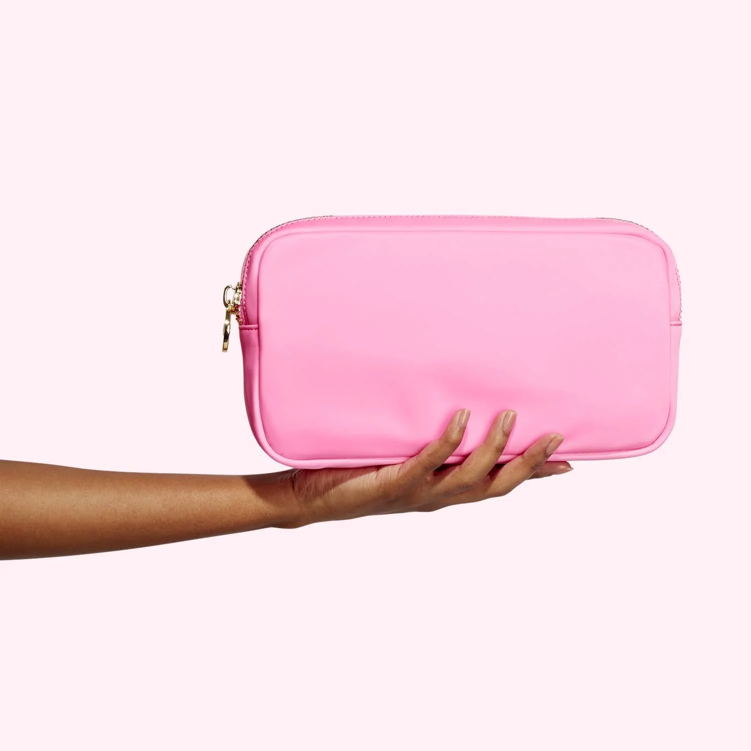 0326_Shot_13_Hand_Model_Small_Pouch_Bubblegum_0003_RT_V3.jpeg