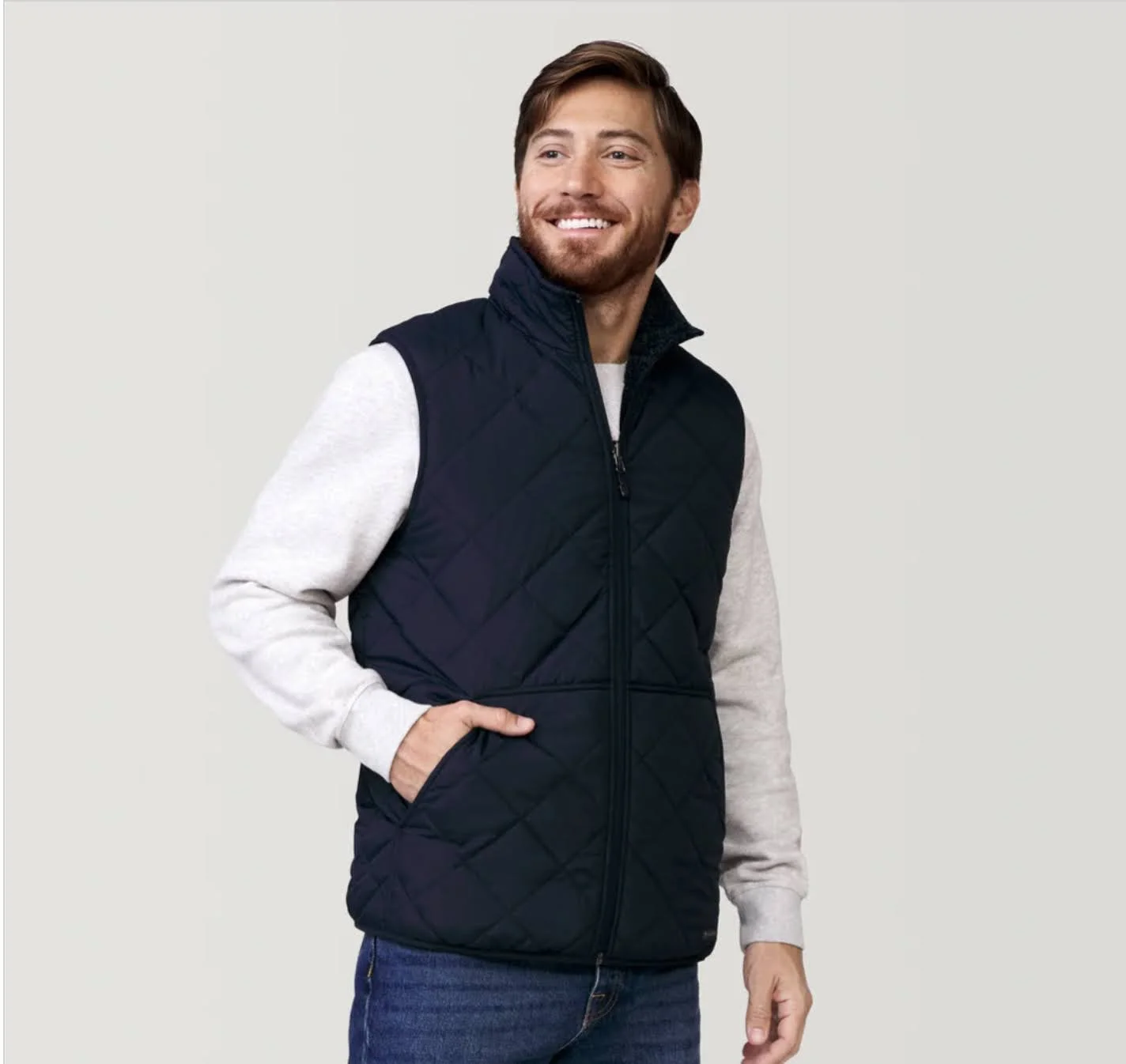 Adam Jepsen 1 - Free Country (Men_s Atlas Quilted Reversible Sherpa Vest).png