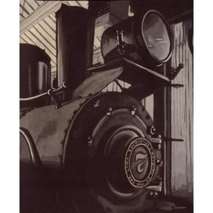 Old steam locomotive in a storage or display area