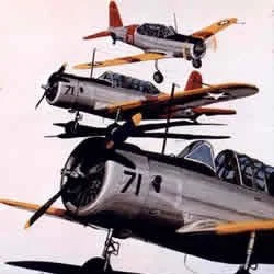 A collection of three vintage aircraft models, including a fighter plane in the foreground and two additional planes above it.