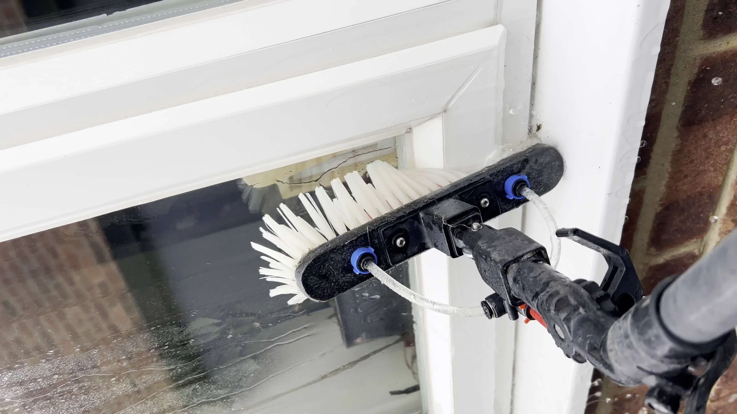 Comparison of window cleaning brushes showing upgrade to professional sill brush.