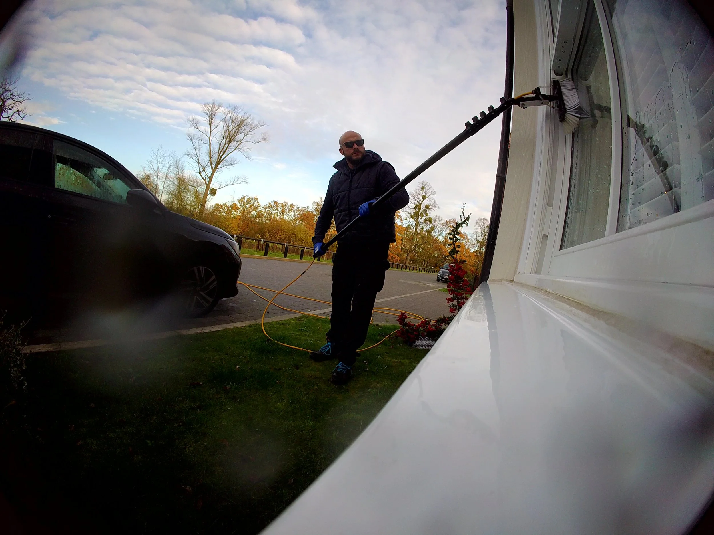 Dan from Sorrell Pressure Wash wearing polarized sunglasses for window cleaning safety Colchester.