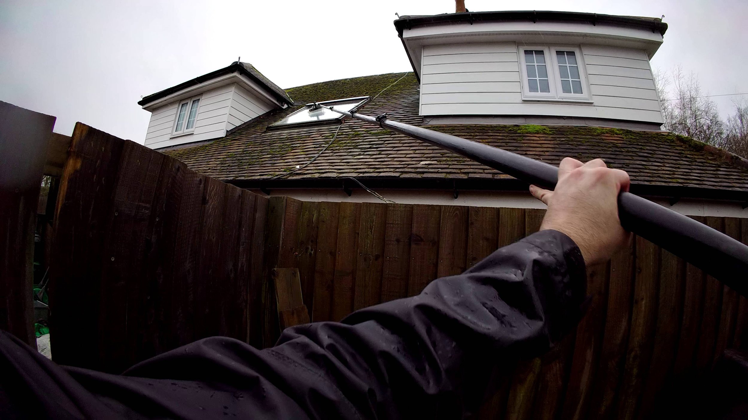 Professional skylight cleaning using a long-reach water-fed pole system in Colchester.
