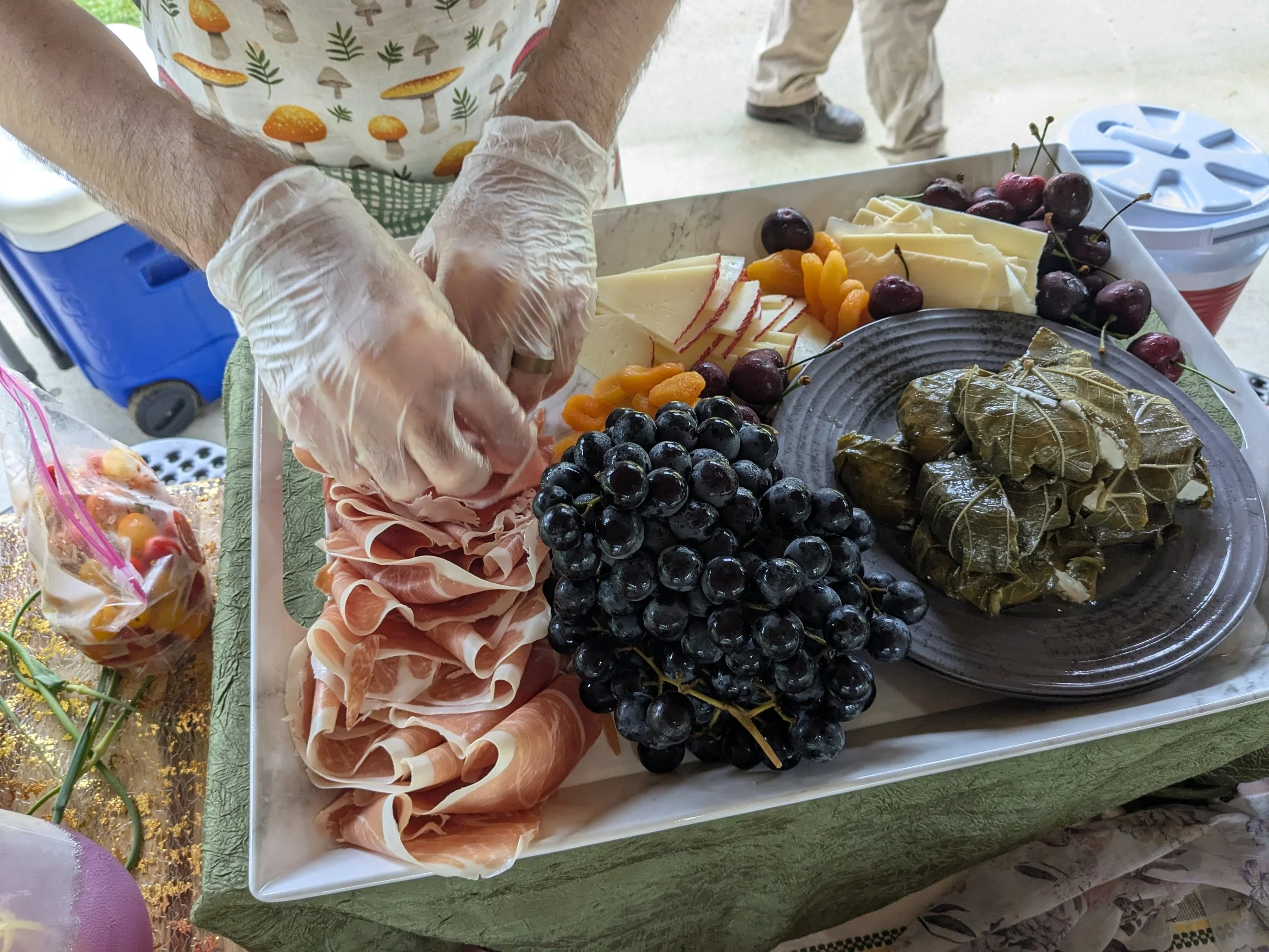 Chef Matthew preparing a grazing board for a private event