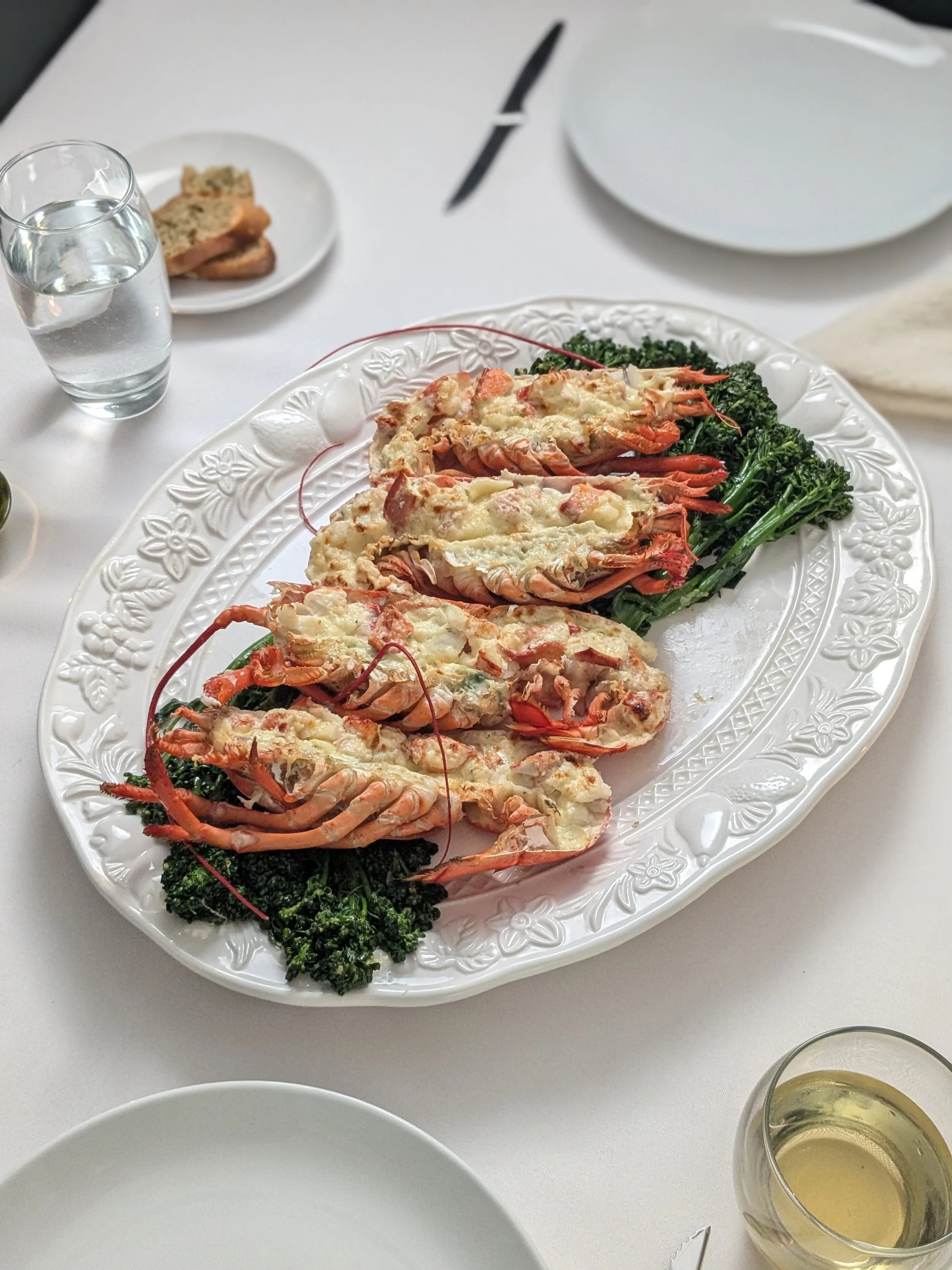 Lobster thermidor with lemon-garlic broccolini