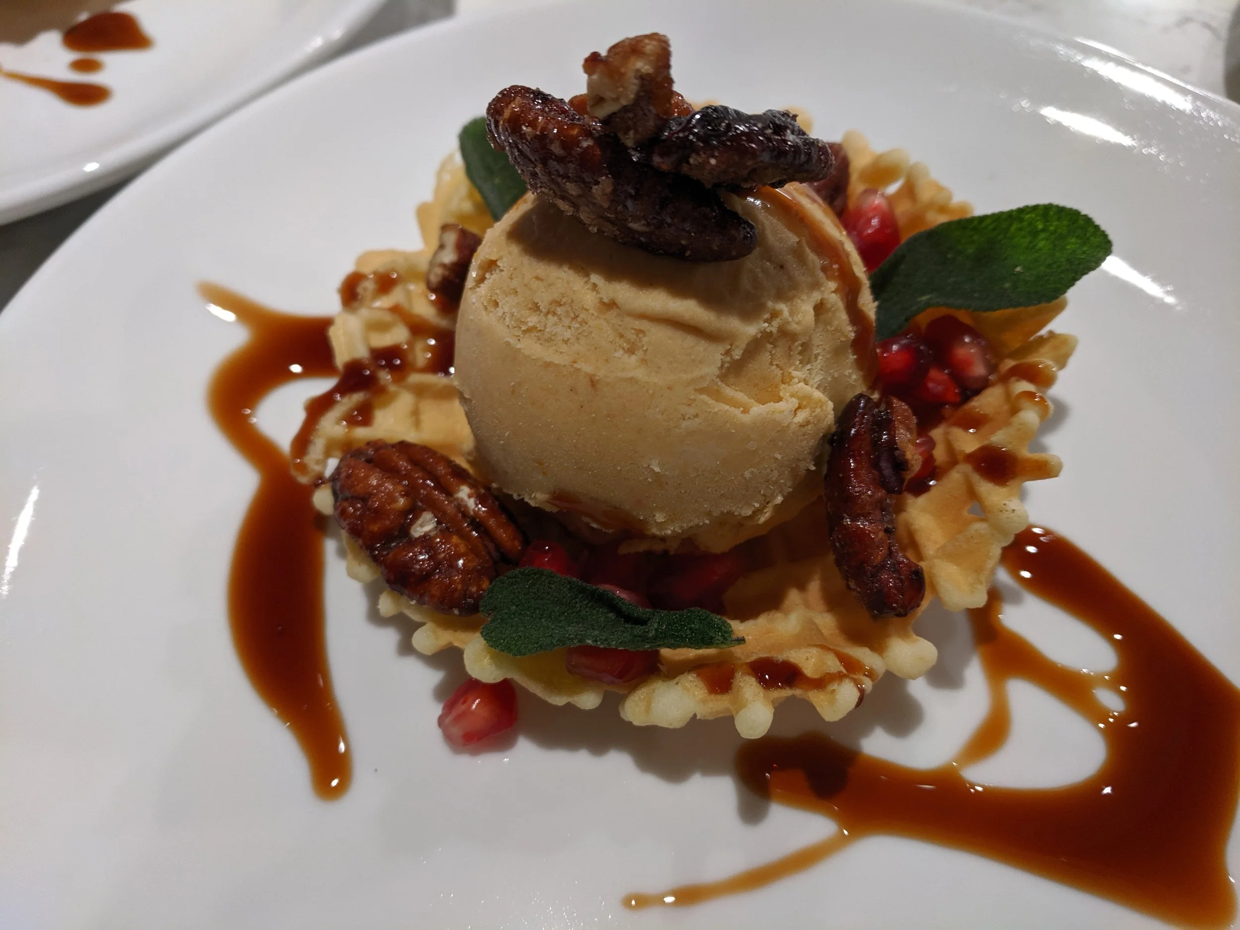 Pumpkin semifreddo with pizzelle, pomegranate, spiced pecans, and sage - private dinners MA