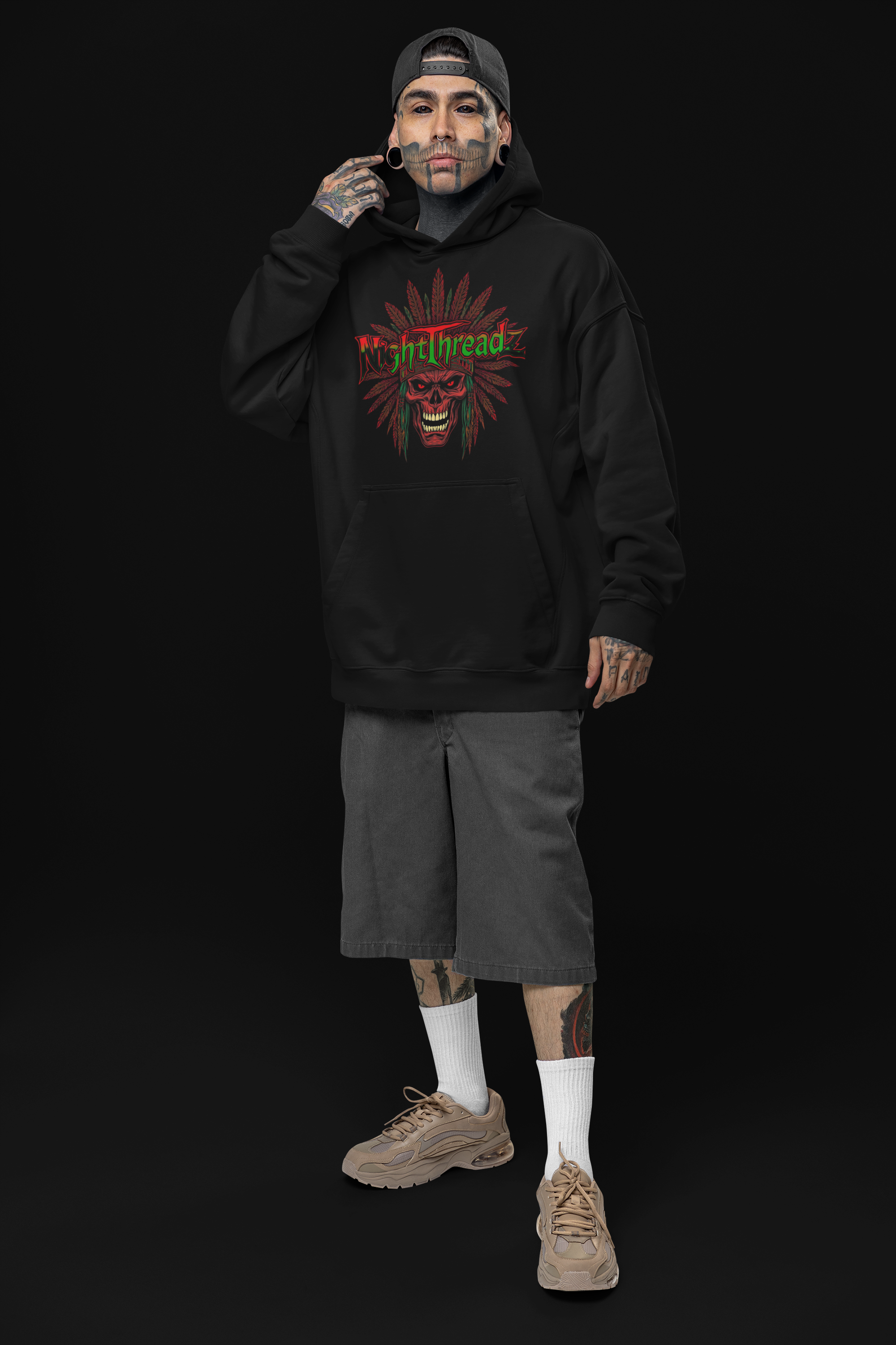 oversized-hoodie-mockup-of-a-tattooed-man-posing-in-a-studio-with-an-alternative-look-m31666 3.png
