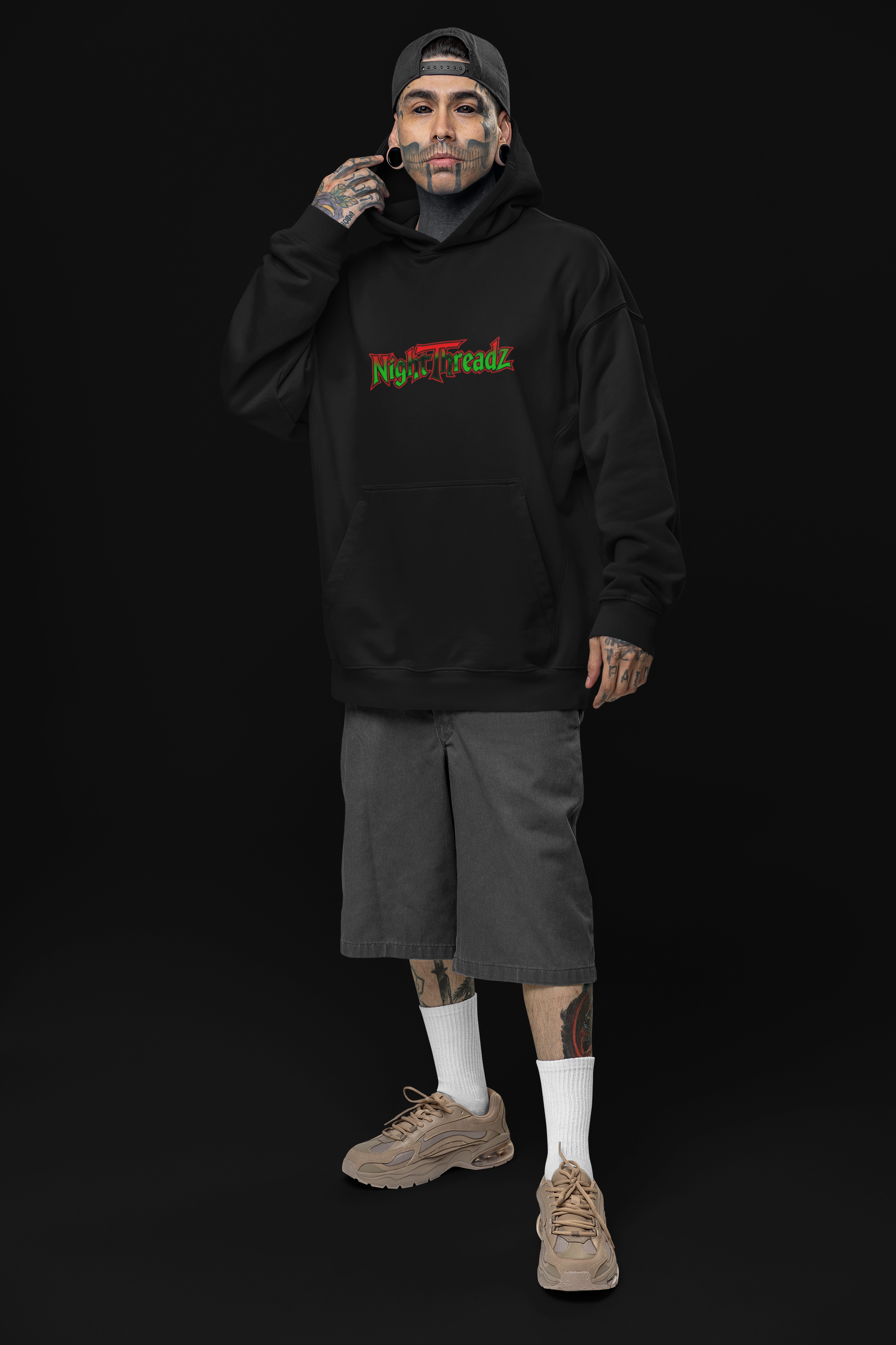 oversized-hoodie-mockup-of-a-tattooed-man-posing-in-a-studio-with-an-alternative-look-m31666 6.png