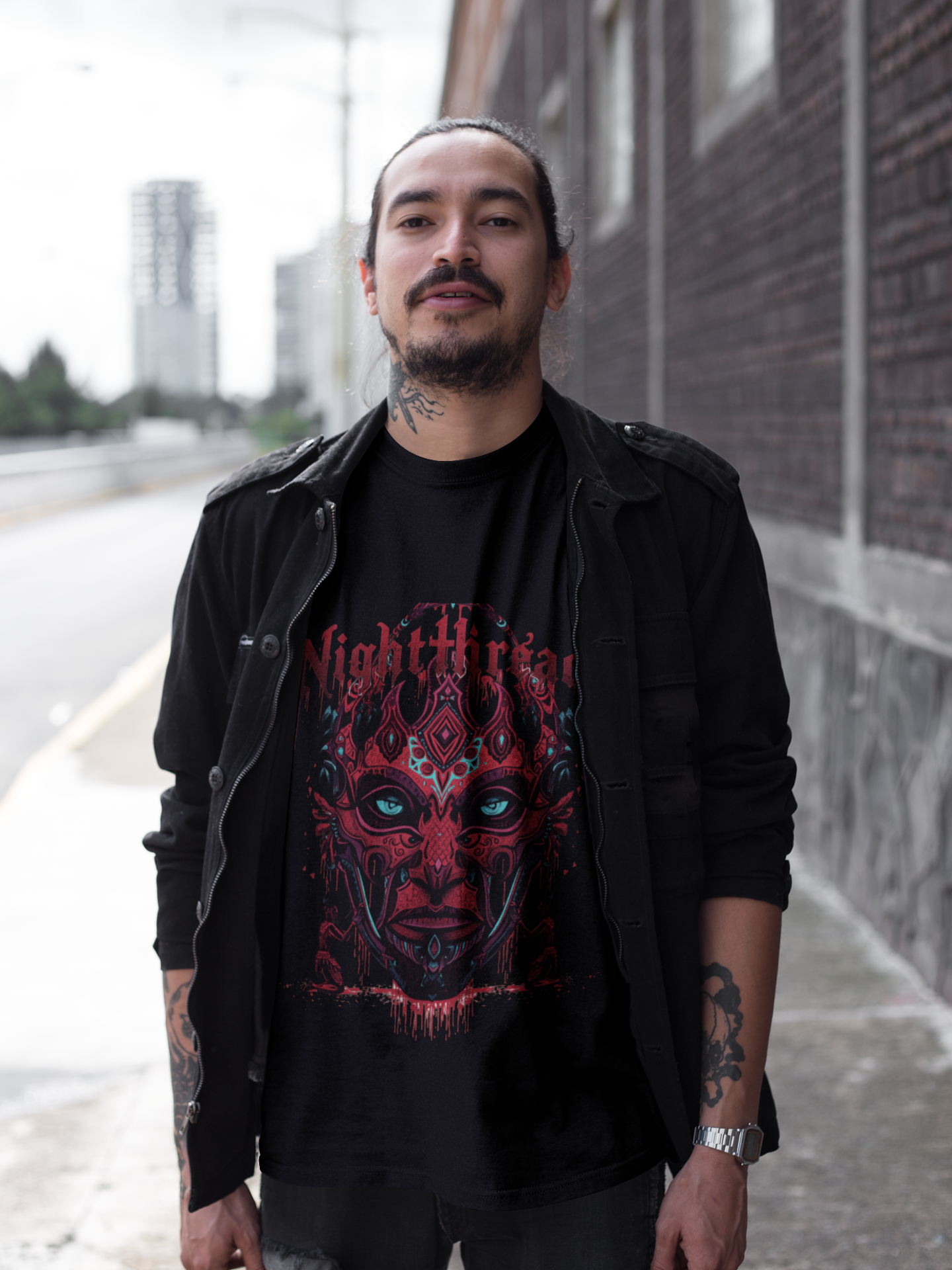 tattooed-man-wearing-a-tshirt-mockup-and-a-black-jacket-while-walking-on-the-street-a17080 3.png