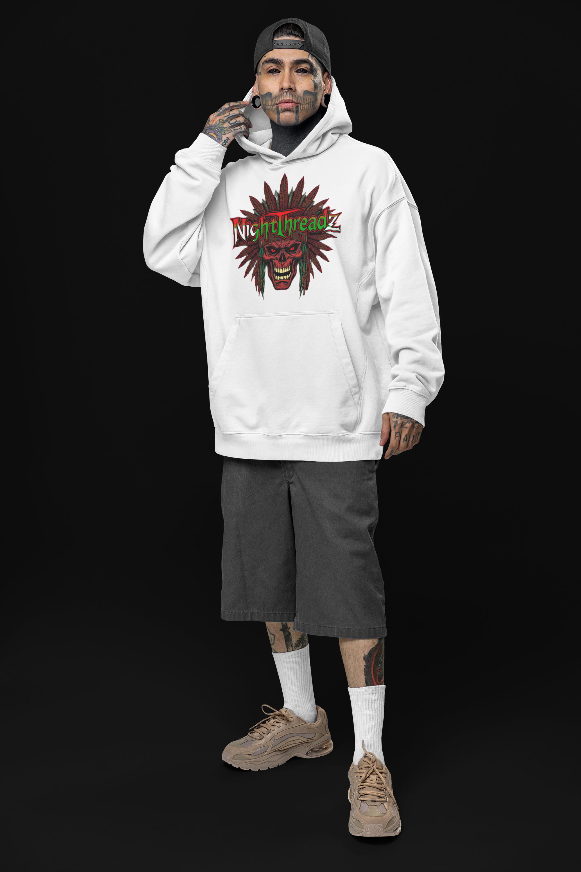 oversized-hoodie-mockup-of-a-tattooed-man-posing-in-a-studio-with-an-alternative-look-m31666 2.png