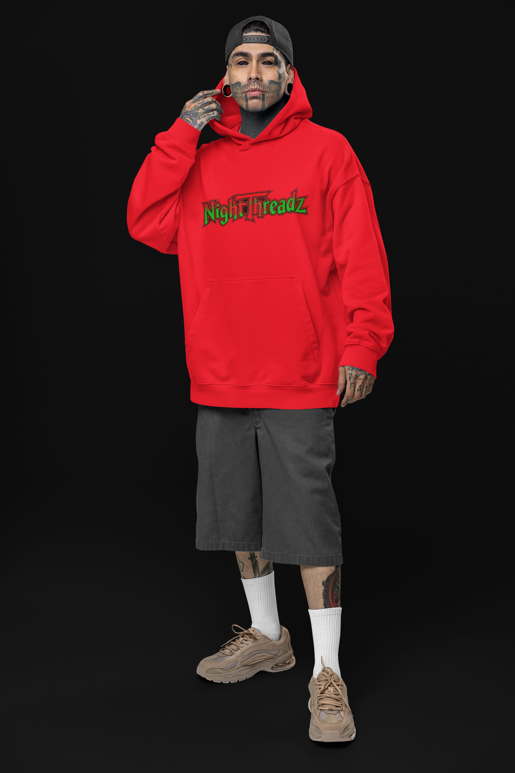 oversized-hoodie-mockup-of-a-tattooed-man-posing-in-a-studio-with-an-alternative-look-m31666 9.png