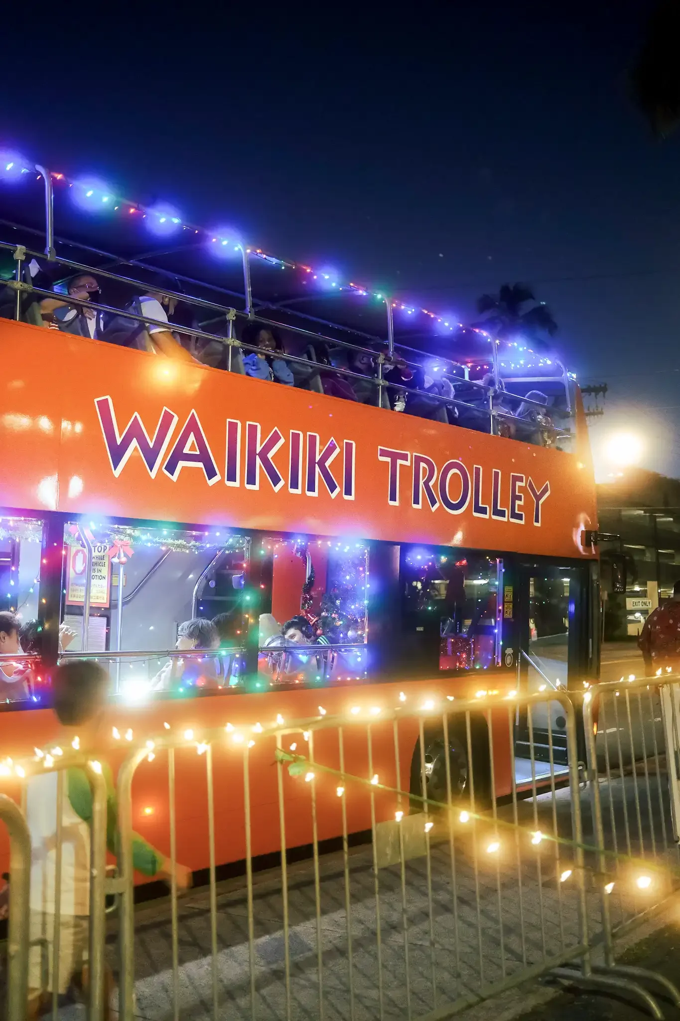 Only Waikiki Trolley you can ride on the double-decker bus to see the Honolulu City Lights.