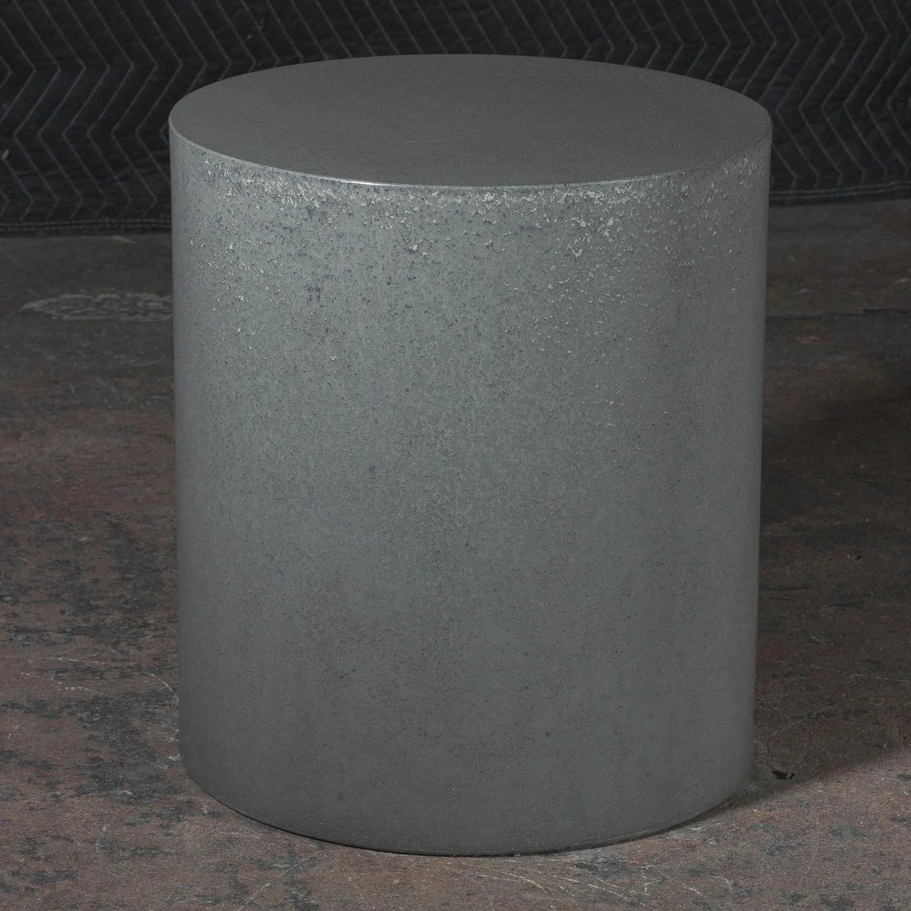 Minimal hand-cast GFRC concrete cylinder showing soft tonal variation and smooth architectural surface detail from The Concrete Anomaly.