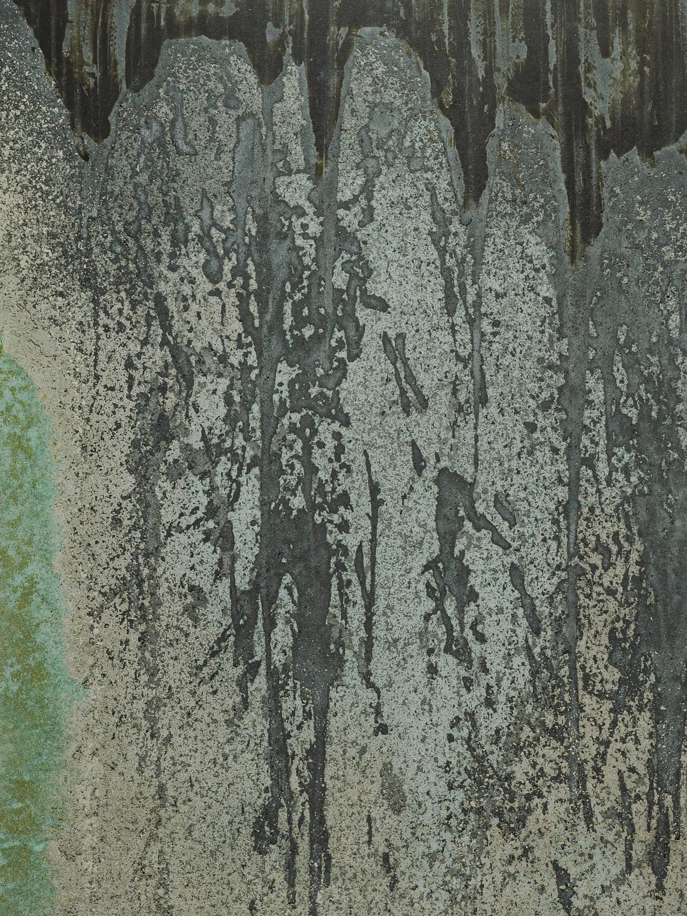 Oxidized concrete surface with layered mineral erosion and black runoff textures