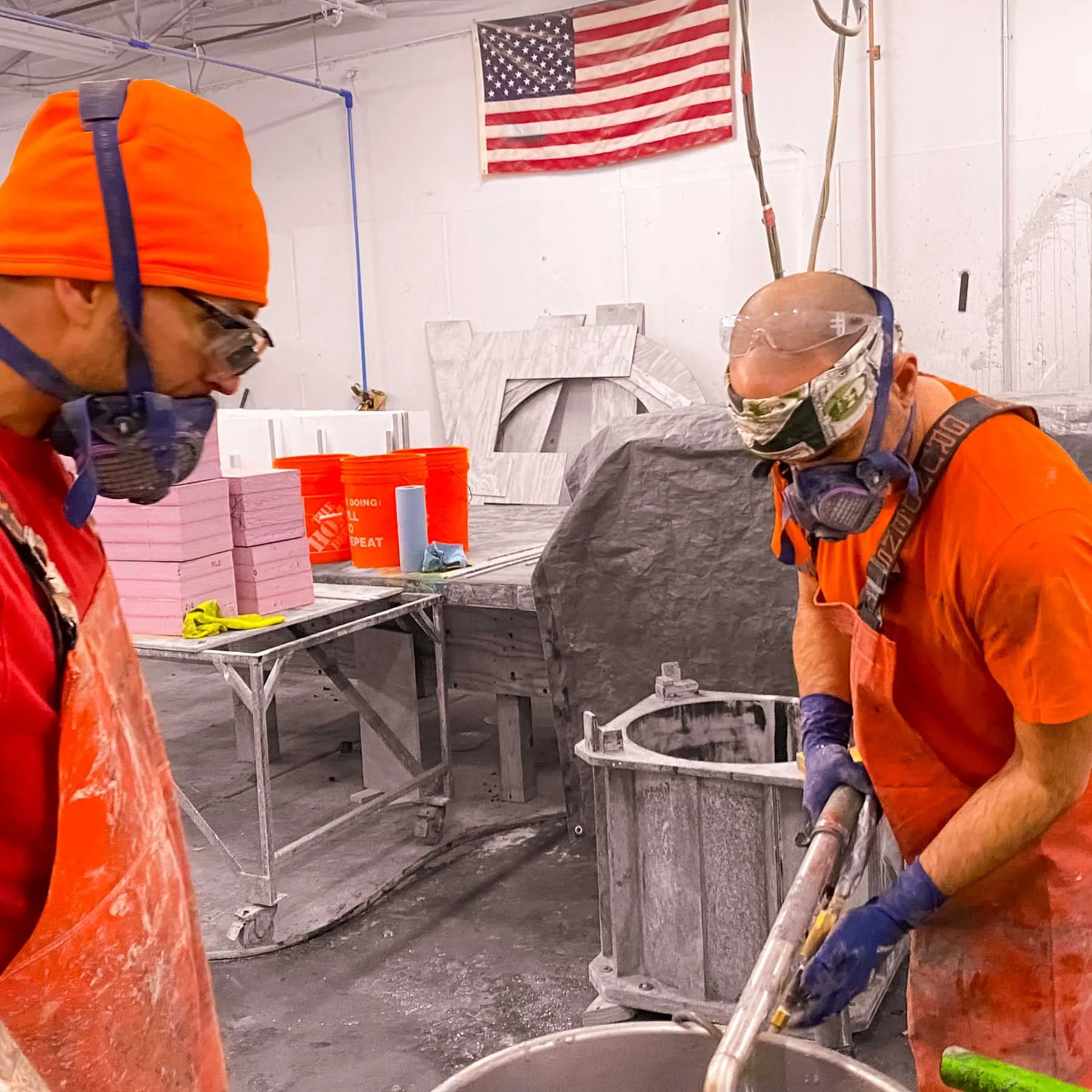 The Concrete Anomaly team mixing concrete during fabrication of the monumental LOVE sculpture.