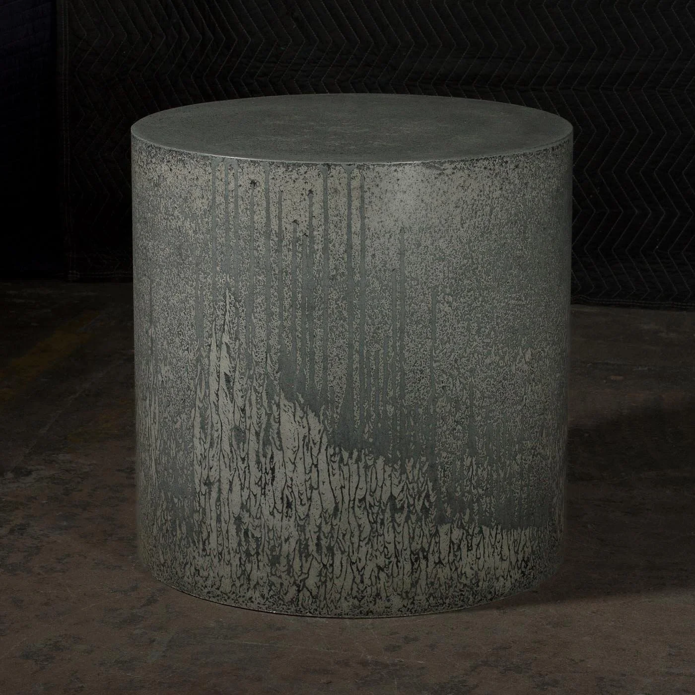 LINE ZERO | Slow Flow — monolithic concrete side table with softened mineral wash finish and atmospheric vertical surface movement.