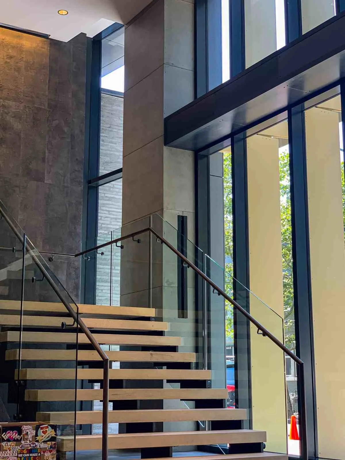 Interior view highlighting custom cast concrete column wrap detailing within a contemporary building.