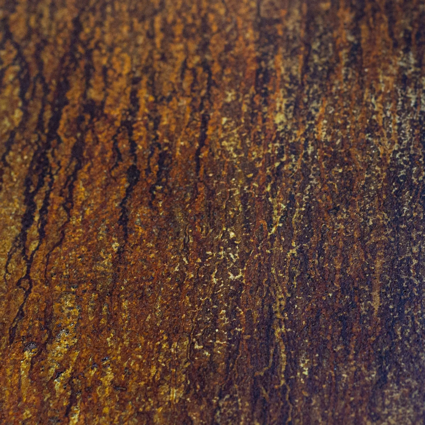 CON-oxd.001 oxidation condition featuring layered rust-like patina, mineral migration, and material accumulation across an architectural concrete surface.