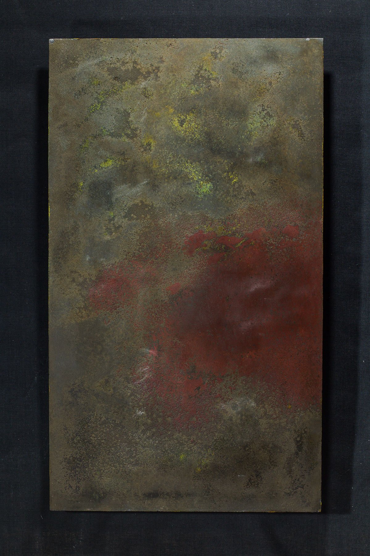 Concrete artifact panel with red oxidation field, mineral texture, and atmospheric layered surface