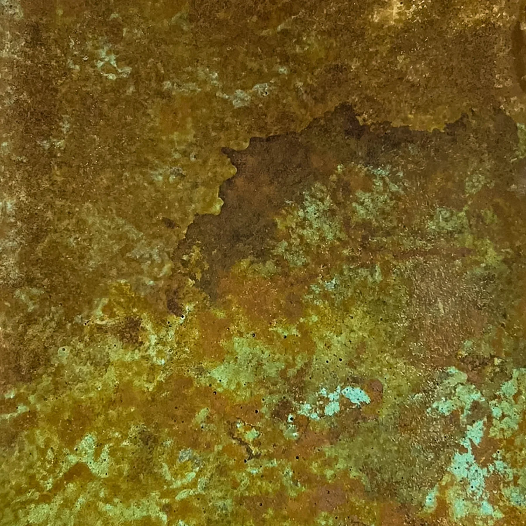 Close-up detail of an oxidized concrete surface featuring layered ochre, tobacco, and turquoise mineral activity with complex weathered texture.