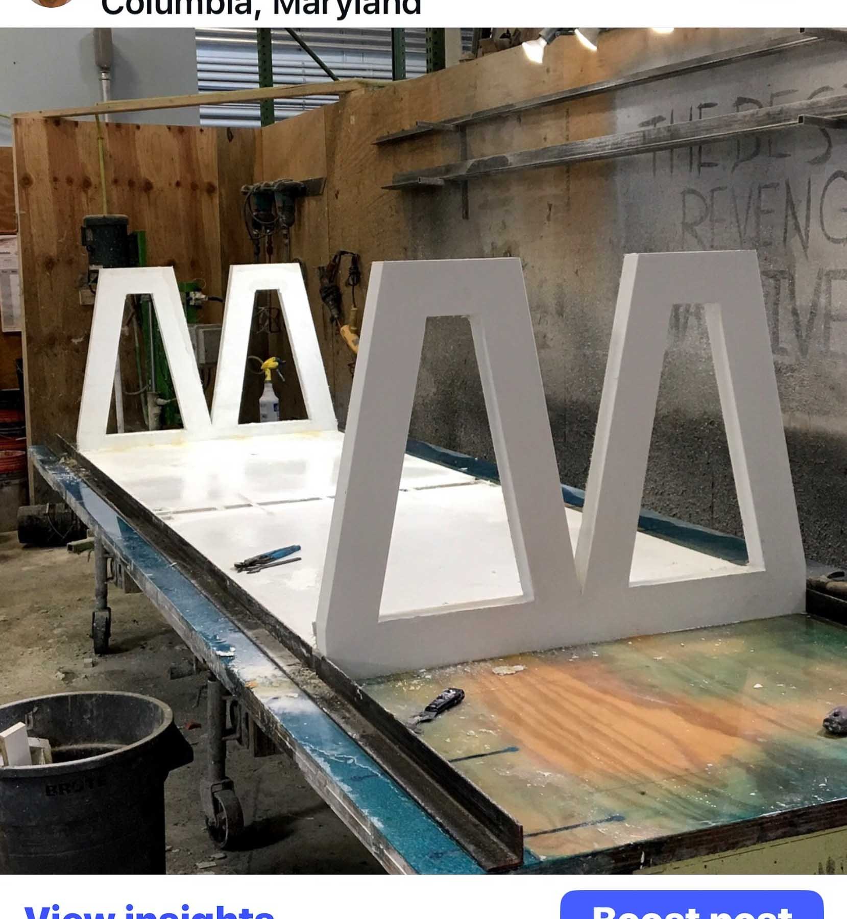 Custom formwork under construction for a large concrete table following a career-altering injury.