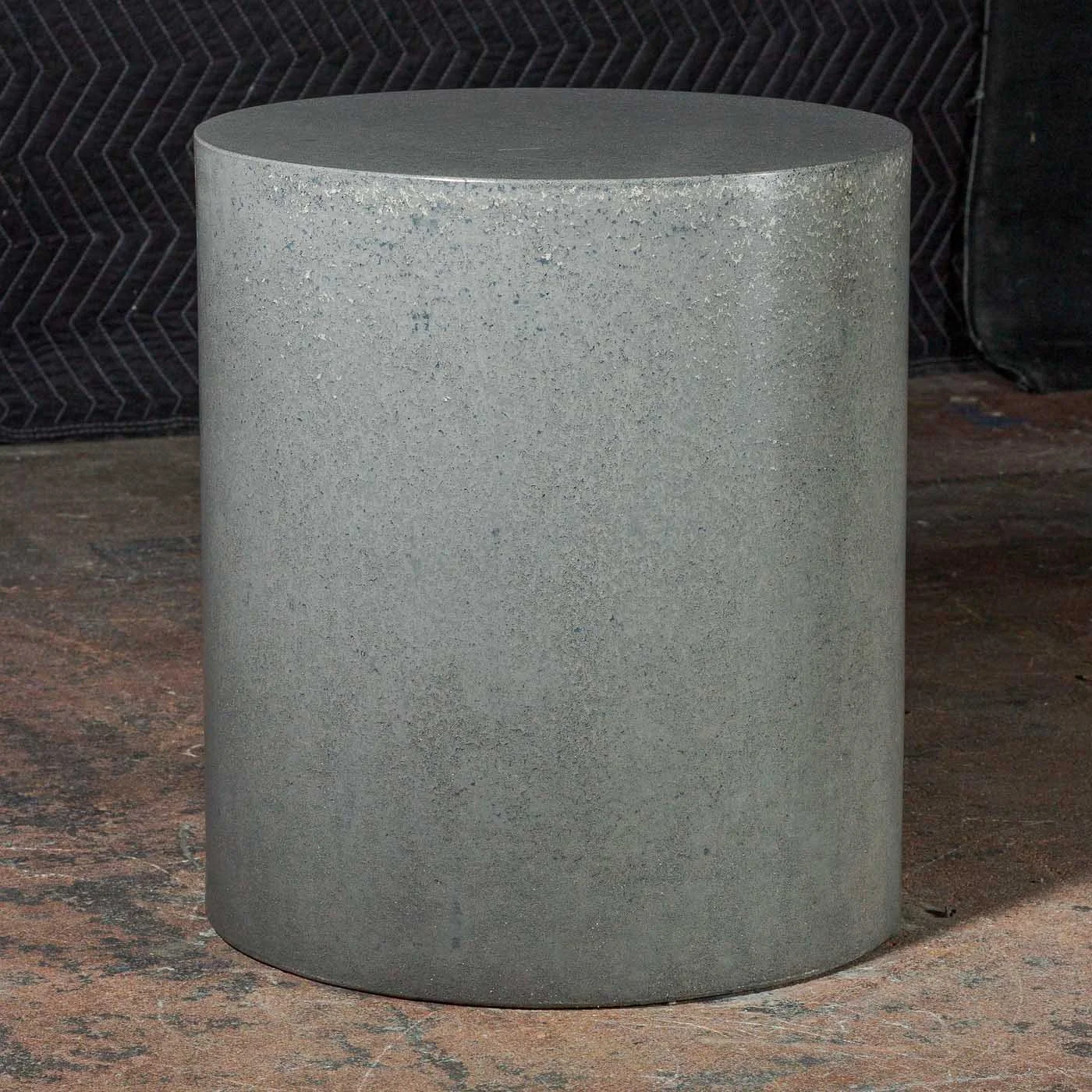 LINE ZERO 004 minimal concrete cylinder with exposed mineral aggregate texture and monolithic architectural form by The Concrete Anomaly.