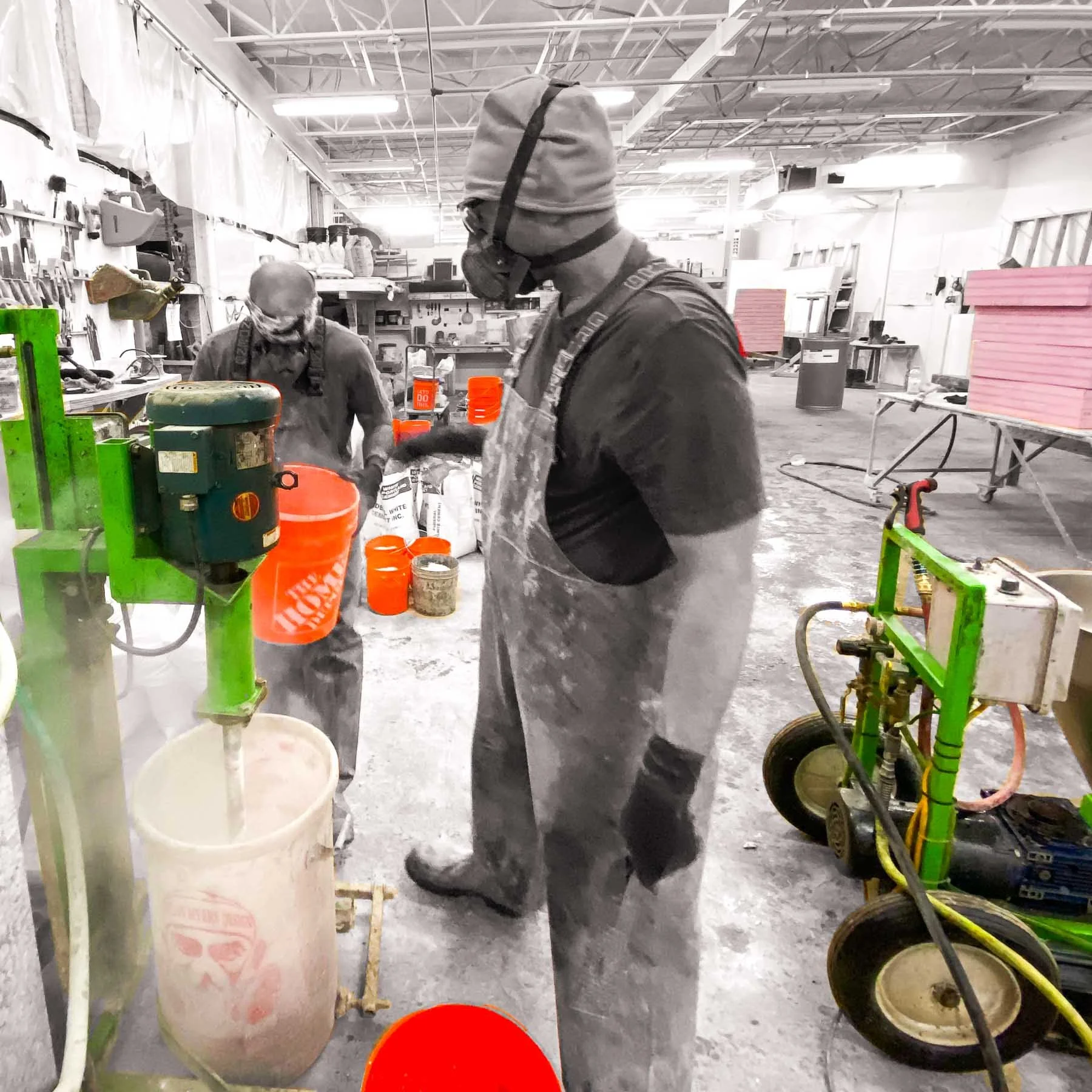 The Concrete Anomaly team batching pigmented concrete in the studio during fabrication of the LOVE sculpture.