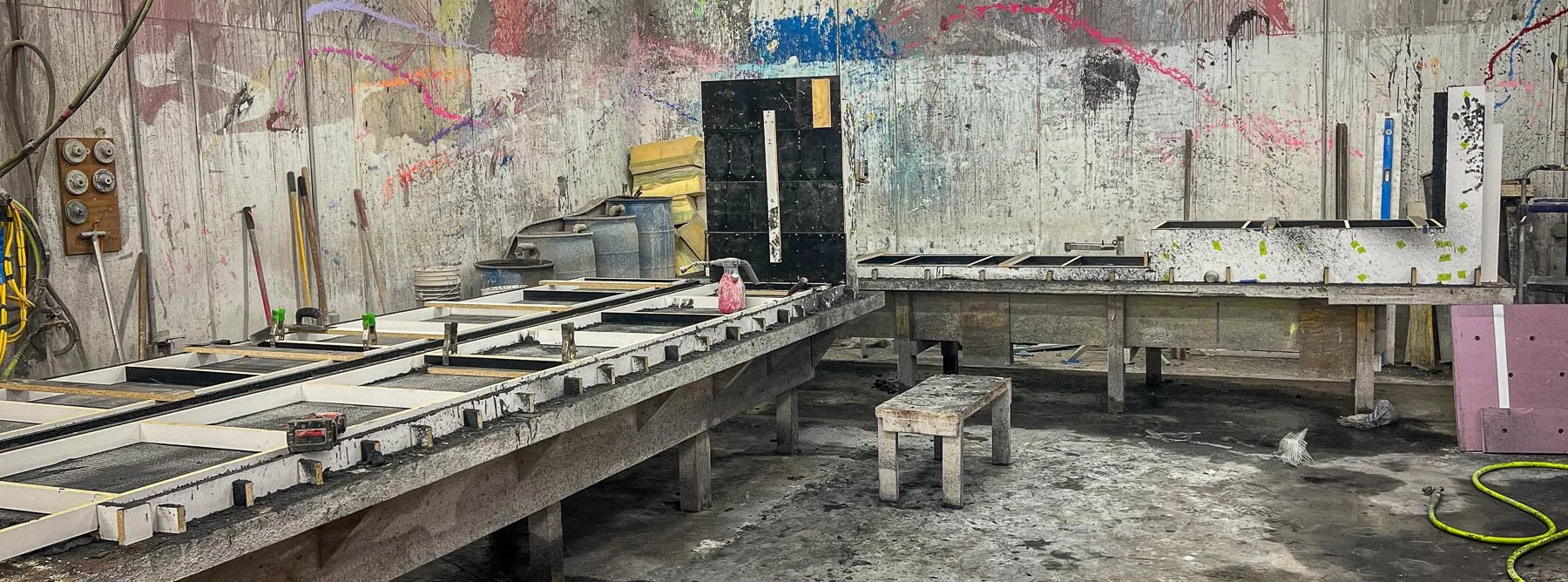 Large-format monolithic concrete front bar formwork immediately after casting for the Miller Lite Pavilion at M&T Bank Stadium fabricated by The Concrete Anomaly in Baltimore, Maryland.