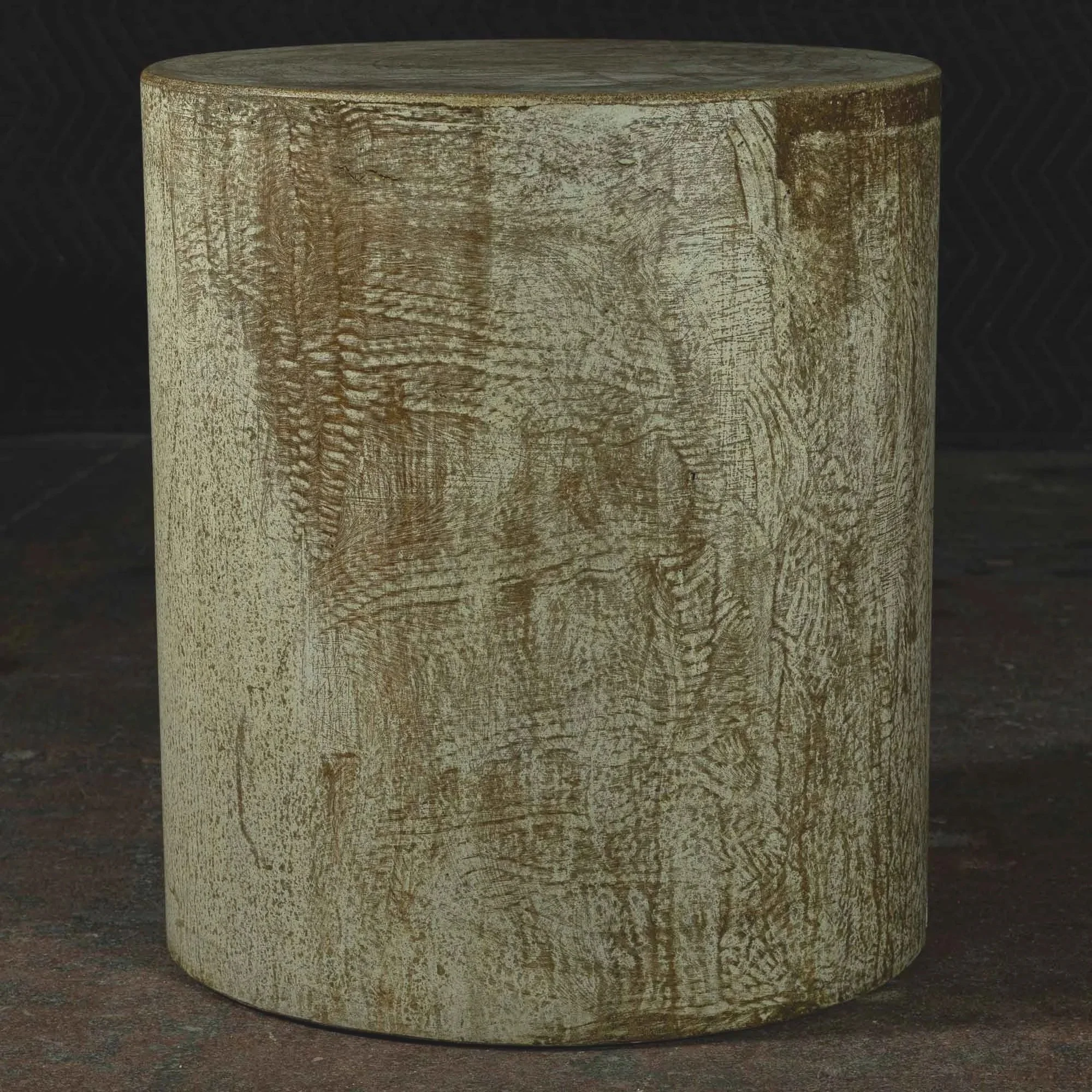 Hand-cast GFRC concrete cylinder with weathered ochre pigment, acid washing, and subtle erosion revealing quiet material movement.