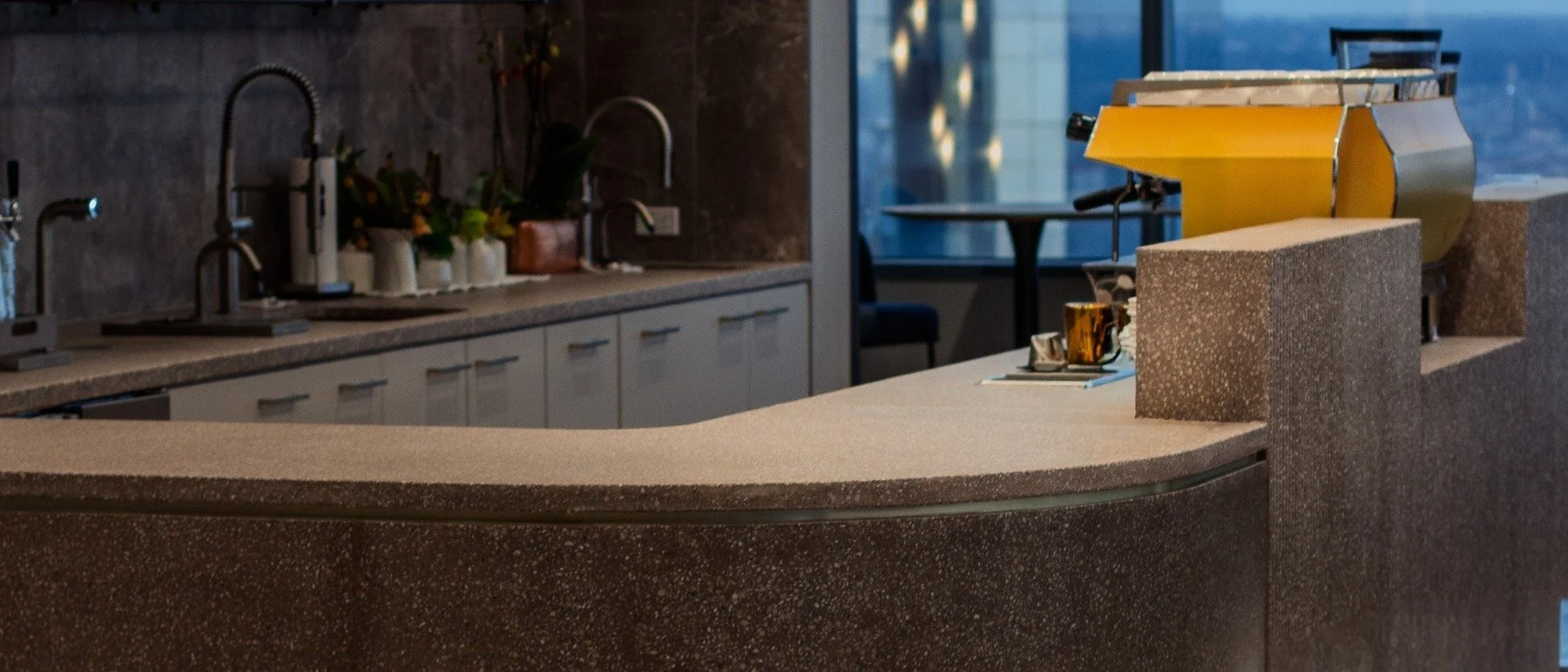Architectural terrazzo concrete barista bar and horizontal surface system created by The Concrete Anomaly for Glenmede headquarters in collaboration with Gensler.