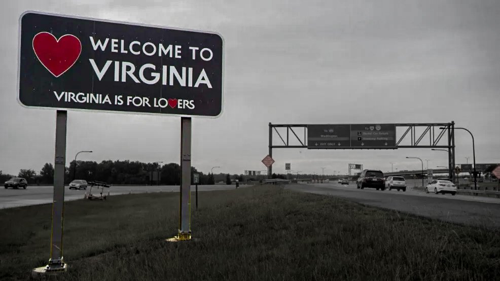 Welcome to Virginia highway sign featuring the Virginia is for Lovers slogan, introducing the statewide LOVEworks public art program.
