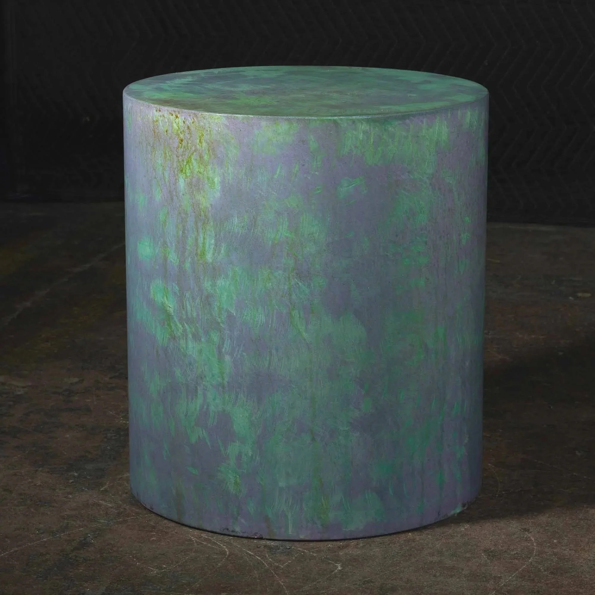 Concrete side table from line ZERO 016 series with layered green and violet mineral patina and monolithic cylindrical form by Dylan Myers.