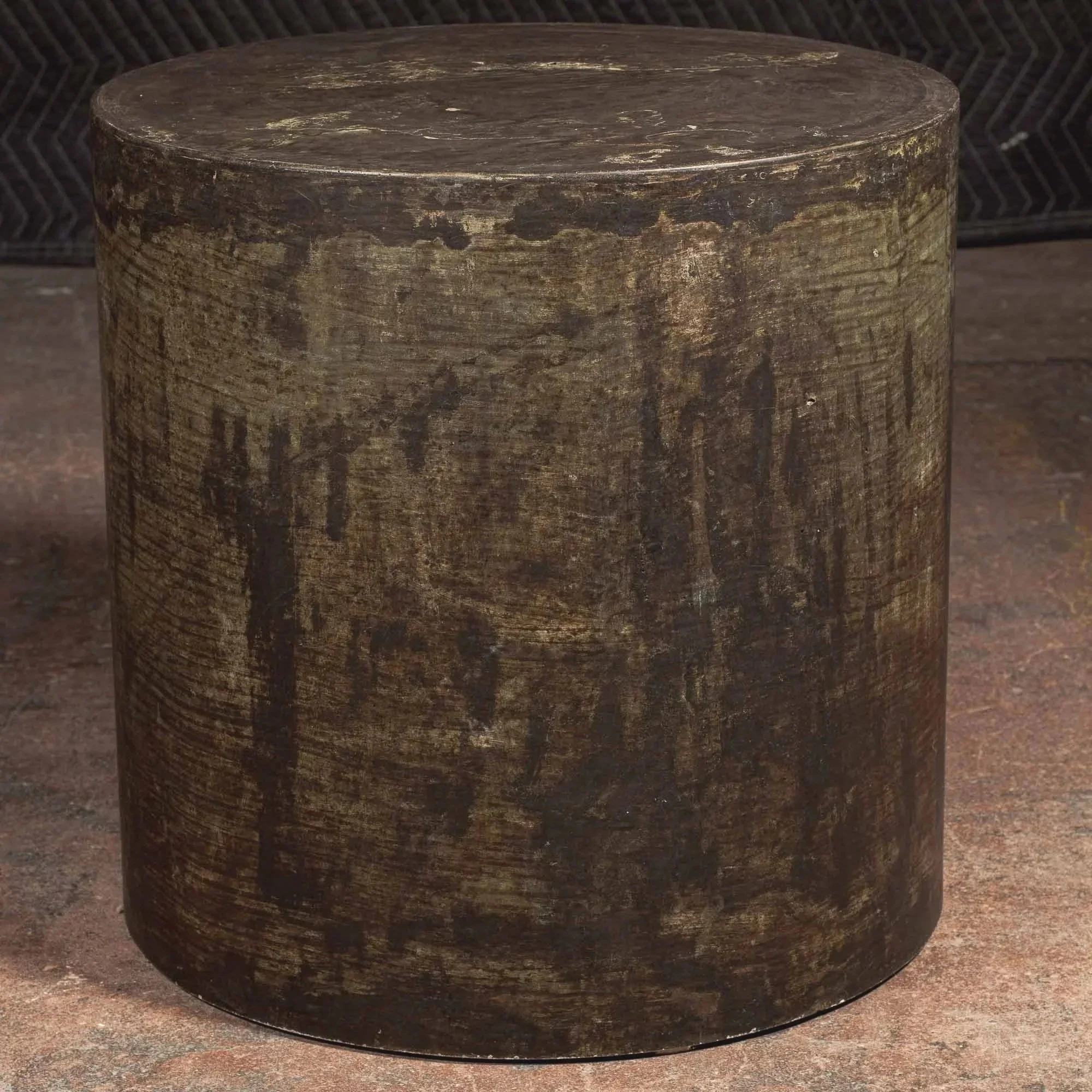 Dark oxidized concrete side table with layered bronze and charcoal patina by Dylan Myers from the Line ZERO series.