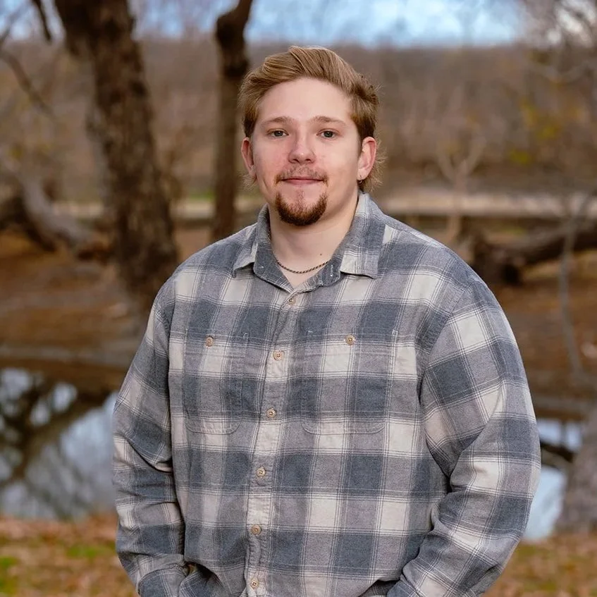 Patrick Phinney by the lake at Plum Creek Recovery Ranch