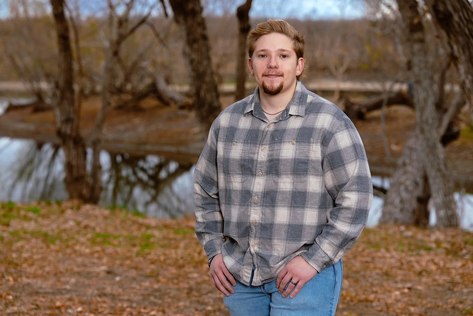 Alumni Coordinator Patrick Phinney by the pond at Plum Creek Recovery Ranch.