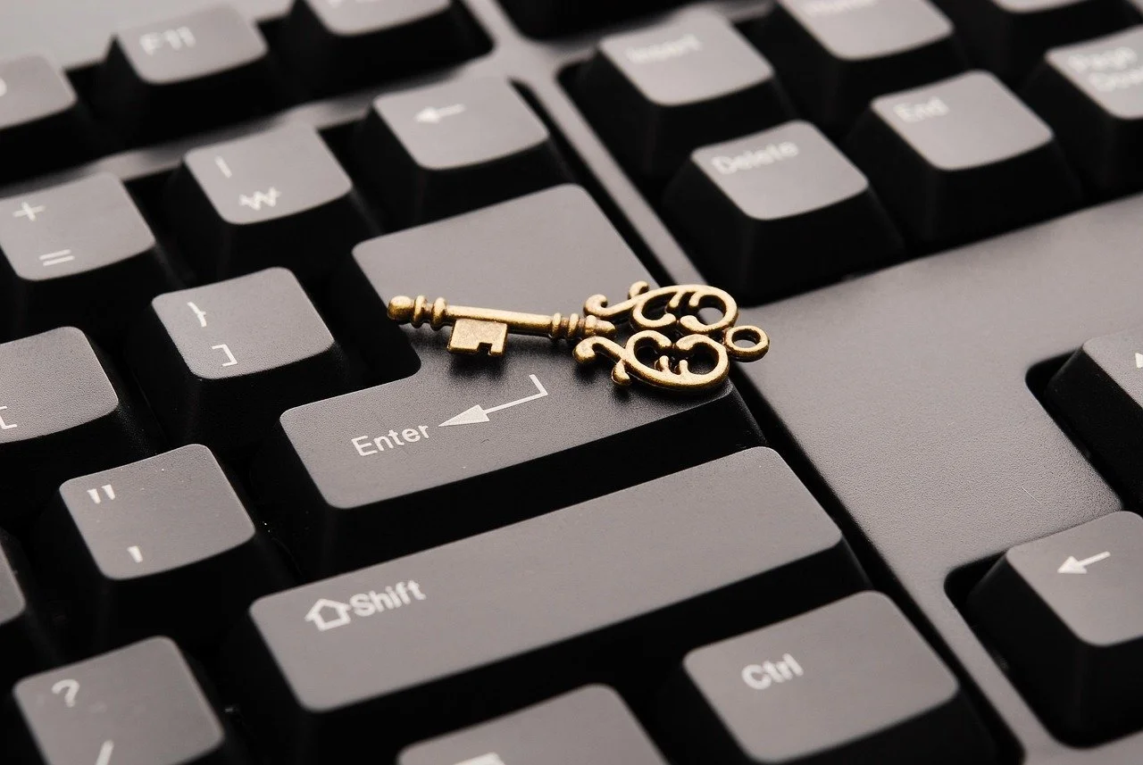 Keyboard with a gold key symbolizing unlocking success through dental hygiene coaching and professional guidance