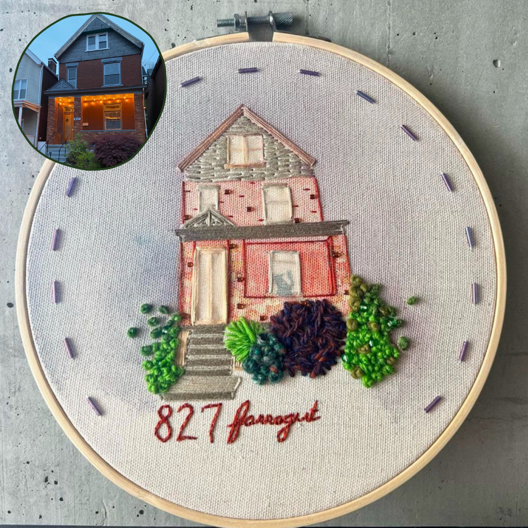  A First Home   
A mixed media rendering of a Victorian home, using watercolor, thread, yarn, sheer fabric, and beads — and their cat in the window.