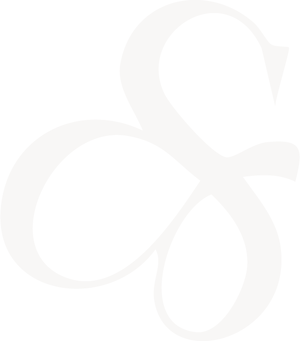 Stylized ampersand in white.