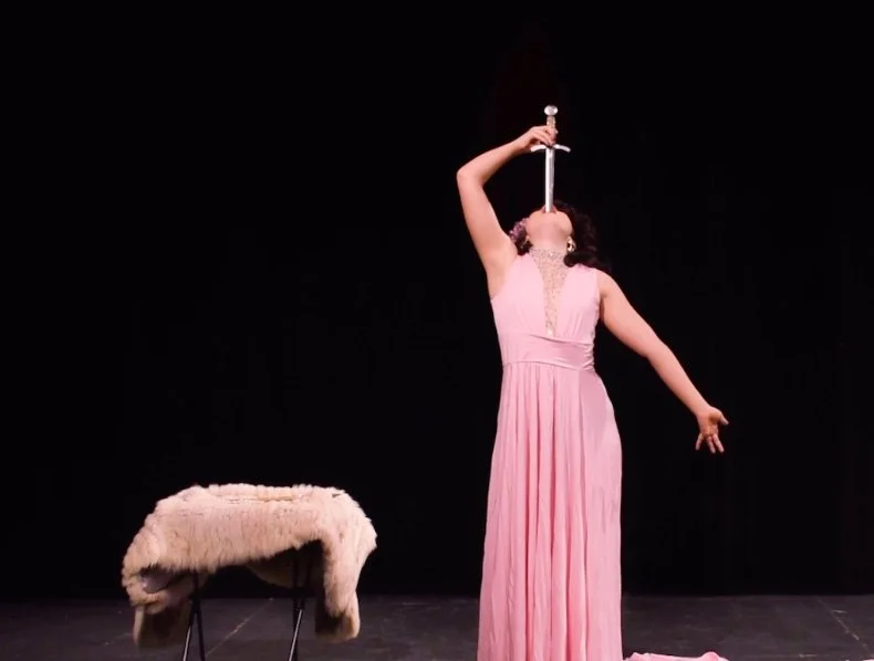 Bambi Karloff swallowing a sword in her pleasure dome act in Bennington, VT.