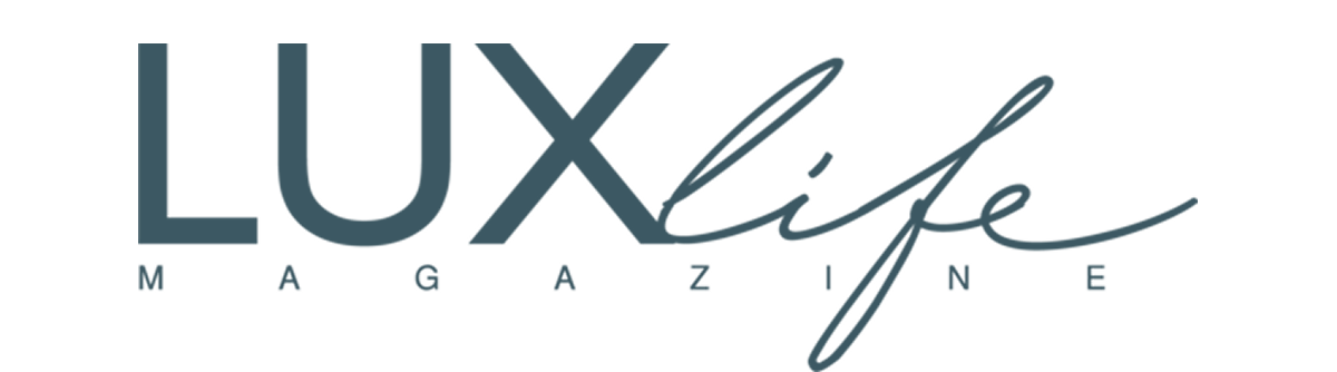 the logo of LUXlife magazine in dark blue