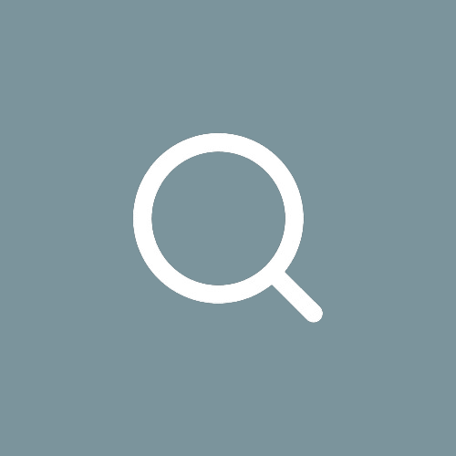 Magnifying glass icon on a grey background