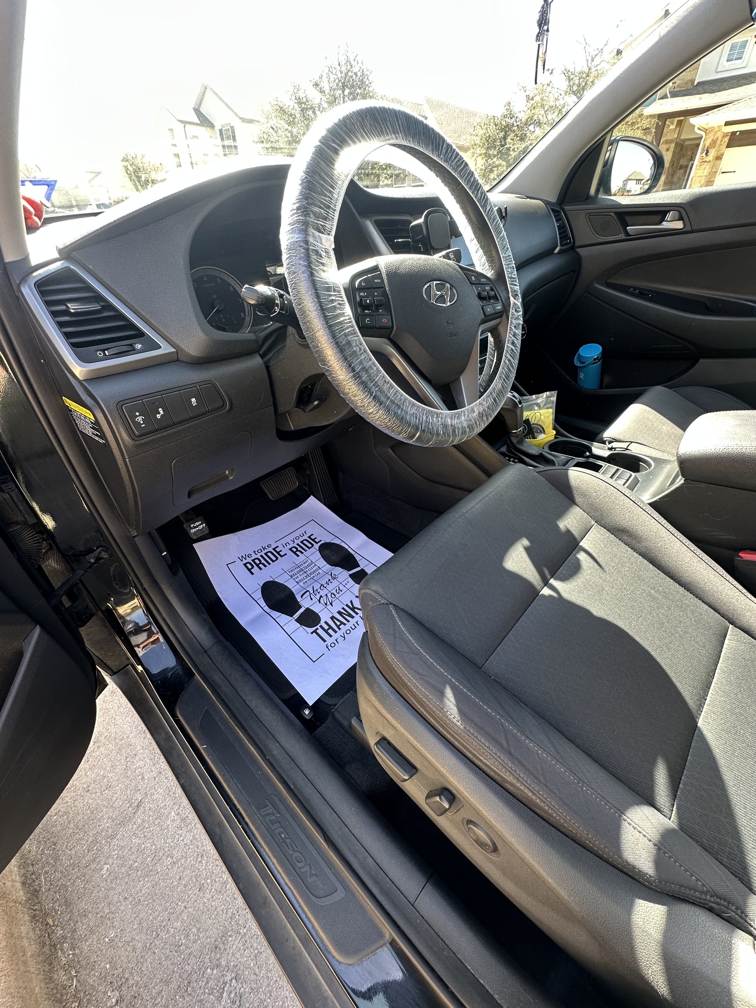 Interior Detail finishes with steering wheel cover and mat paper in Hutto Texas