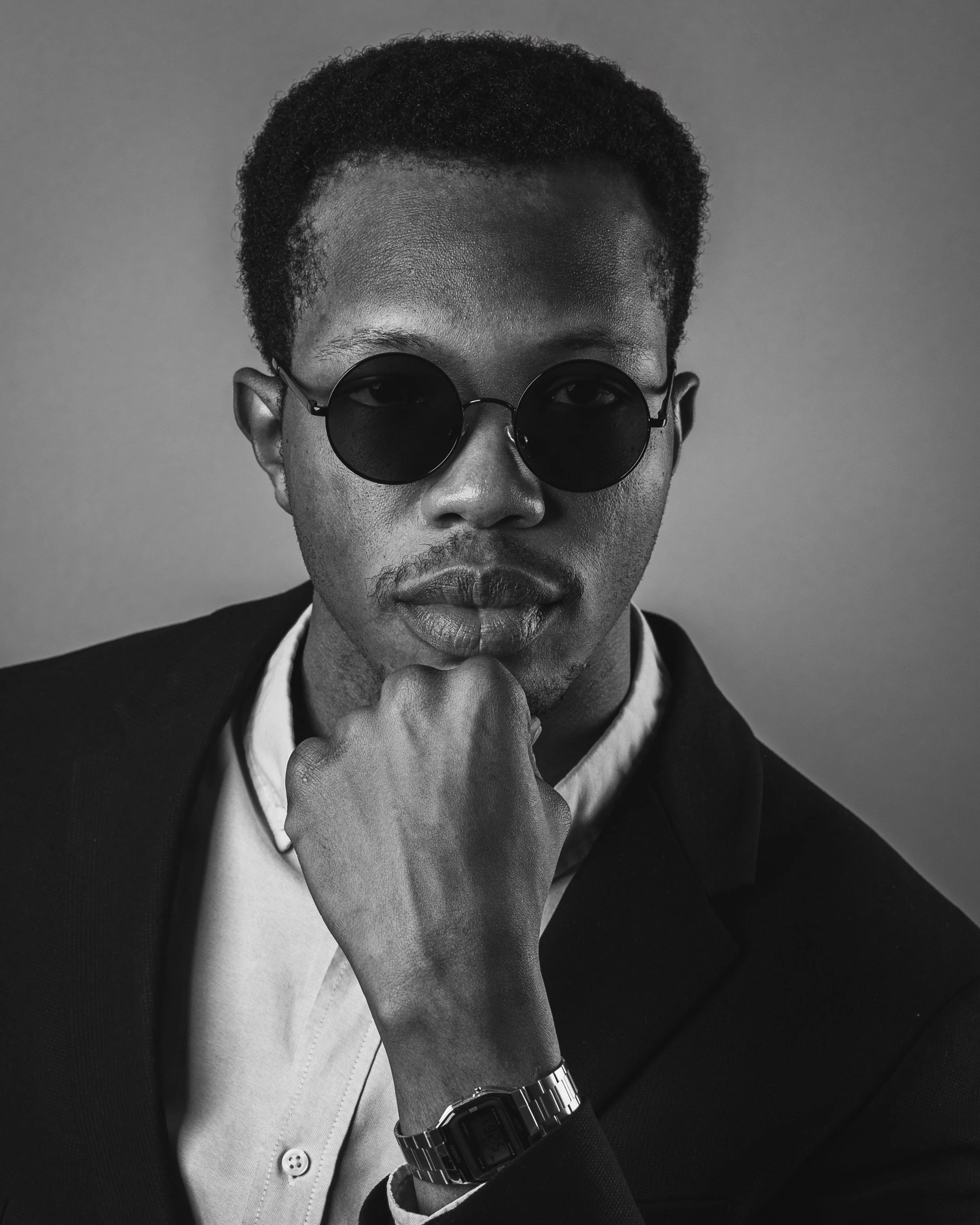 Headshot of a stylish man taken in Poland, showcasing professional portrait photography
