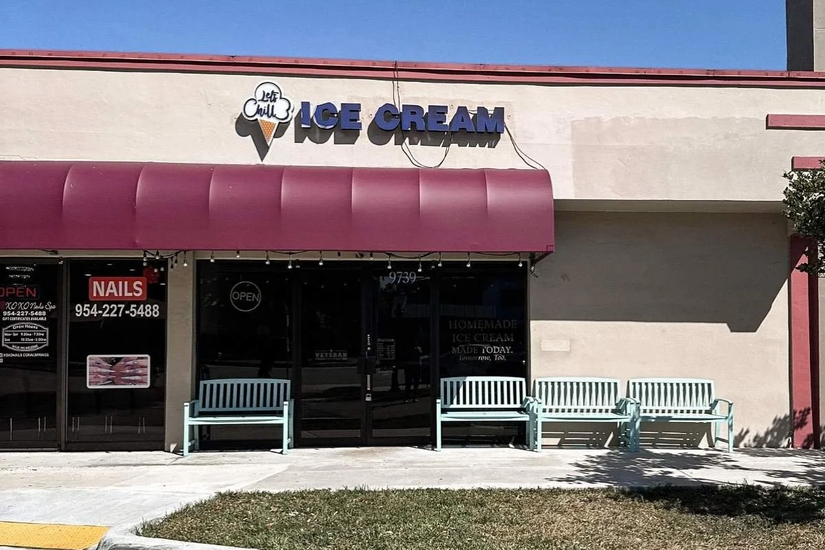 Freshly cleaned sidewalk in front of Let’s Chill Homemade Ice Cream in Coral Springs after exterior surface cleaning