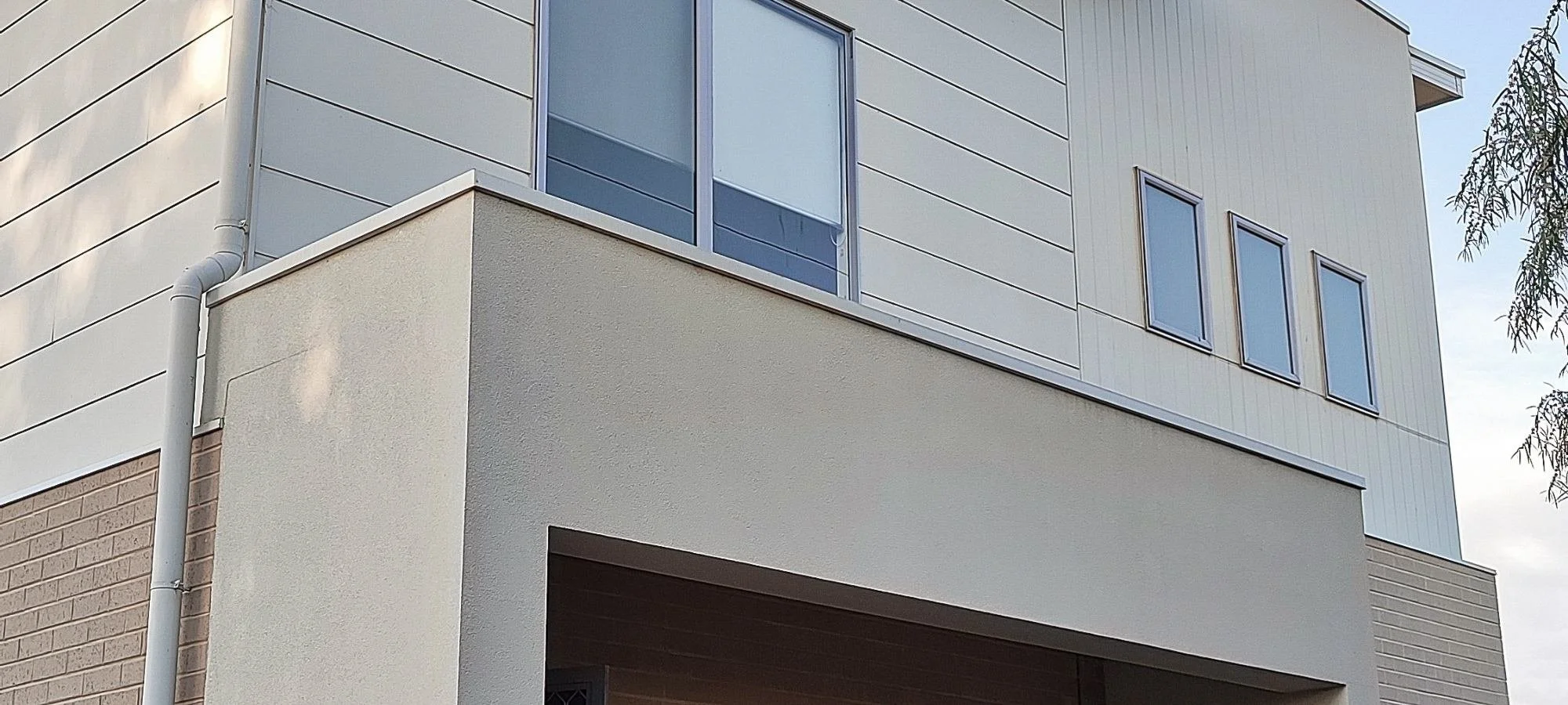 Residential home exterior included in a coordinated exterior cleaning plan in Broward County.