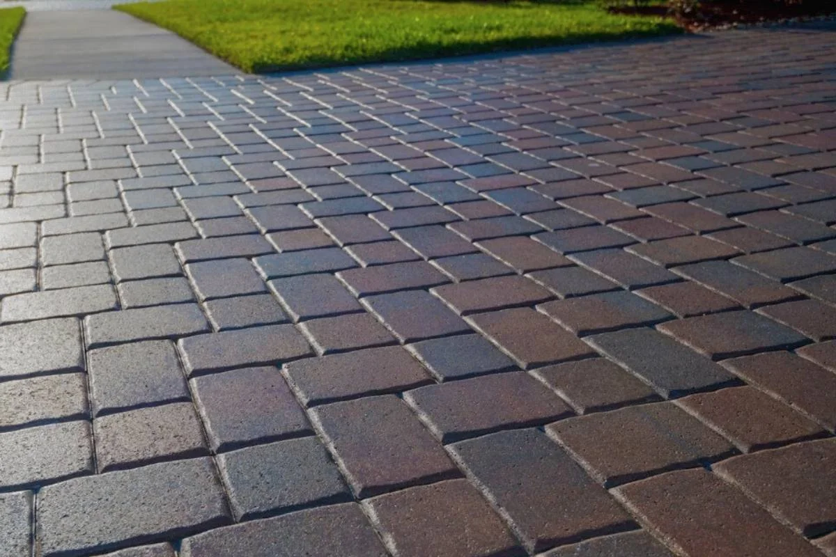 Residential driveway prepared for sale in South Florida with clean and uniform paver surface.