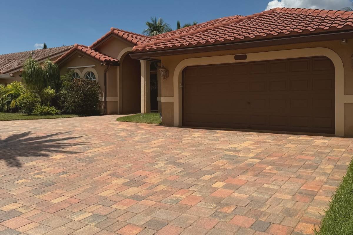Cleaned and sealed paver driveway in Coral Springs after cleaning, resanding, and sealing.
