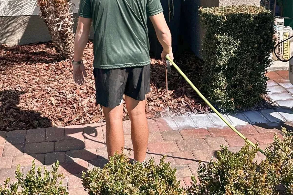 Professional paver surface preparation before sealing in Coral Springs Florida.